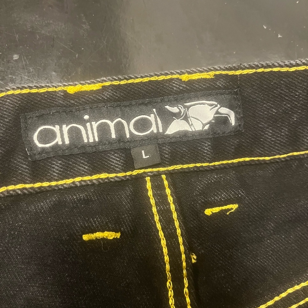 Animal Men's Black Jeans with Yellow Accents